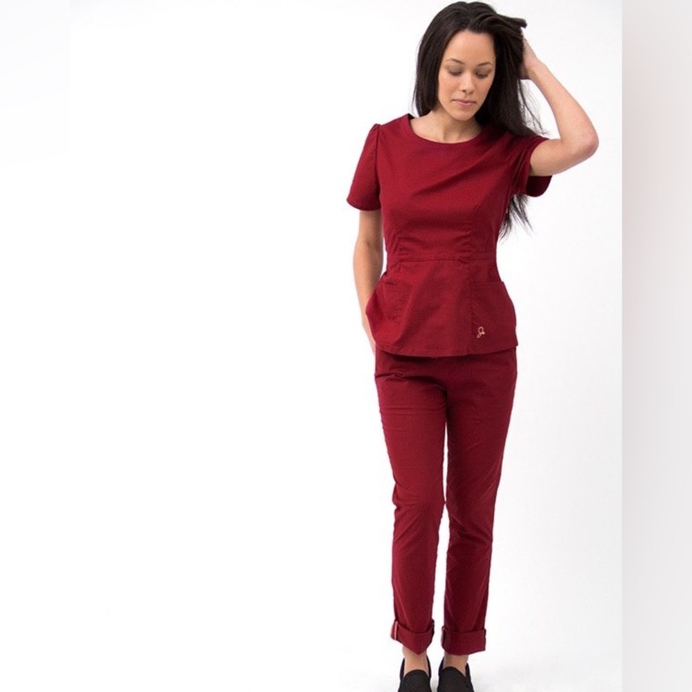 Red Jaanuu peplum top and moto bottoms
